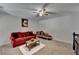 Bright living room with comfortable furniture and neutral carpet floors at 2639 Cooper Brook Dr, Snellville, GA 30078