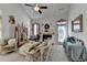 Formal living room with high ceilings, decorative fireplace, and elegant furnishings at 2639 Cooper Brook Dr, Snellville, GA 30078