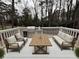 Inviting deck featuring comfortable seating and an outdoor kitchen perfect for entertaining at 3663 Heatherwood Ne Dr, Marietta, GA 30066