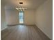 Inviting dining room with modern lighting and a large window allowing for natural light at 3663 Heatherwood Ne Dr, Marietta, GA 30066