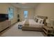 Stylishly furnished main bedroom with a comfortable bed, dresser, and plenty of natural light at 3663 Heatherwood Ne Dr, Marietta, GA 30066