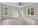 Spacious bedroom with lots of natural light, a ceiling fan, and light wood floors at 462 Connally Se St, Atlanta, GA 30312