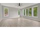 Bedroom boasts an abundance of natural light from the large windows surrounding the space at 462 Connally Se St, Atlanta, GA 30312