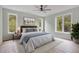 Inviting bedroom with a plush bed, soft lighting, and large windows with a view at 462 Connally Se St, Atlanta, GA 30312