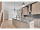 Modern kitchen with stainless steel appliances, a large center island, and unique backsplash at 462 Connally Se St, Atlanta, GA 30312