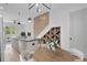 Contemporary kitchen featuring a large island, modern lighting, wine rack, and hardwood floors at 462 Connally Se St, Atlanta, GA 30312