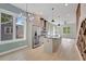 Bright, modern kitchen features stainless steel appliances, large island, and an open design for easy entertaining at 462 Connally Se St, Atlanta, GA 30312