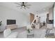 Open-concept living space with kitchen, dining and living areas, designed for modern living and seamless entertaining at 462 Connally Se St, Atlanta, GA 30312