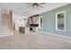 Open-concept living space with kitchen, living, and dining areas, seamlessly connected for modern living and entertaining at 462 Connally Se St, Atlanta, GA 30312