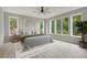 Bright main bedroom with large windows, light wood floors, and neutral decor at 462 Connally Se St, Atlanta, GA 30312