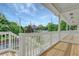Charming porch with white railings and wood flooring at 462 Connally Se St, Atlanta, GA 30312