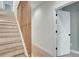 Staircase with wood treads and white risers, leading to the upper level with stylish wood railing at 462 Connally Se St, Atlanta, GA 30312
