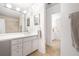 Bright bathroom with large vanity, tiled floors, and access to the adjacent rooms at 5170 Chemin De Vie Ne, Sandy Springs, GA 30342