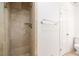 The bathroom features a tiled shower with a rainfall shower head and stylish fixtures at 5170 Chemin De Vie Ne, Sandy Springs, GA 30342