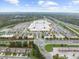 An impressive aerial view of a large shopping center with ample parking and easy highway access at 218 Floral Valley Dr, Woodstock, GA 30188