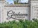Glenhaven at Ridgewalk community signage provides an inviting entrance, complemented by well-maintained landscaping at 218 Floral Valley Dr, Woodstock, GA 30188