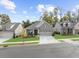 A street view showcases this beautiful single-story home with well-maintained landscaping at 218 Floral Valley Dr, Woodstock, GA 30188