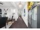 Inviting foyer featuring dark wood floors, a chandelier, and decorative details at 218 Floral Valley Dr, Woodstock, GA 30188