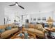 Spacious living room with an open floor plan into the dining room and kitchen at 218 Floral Valley Dr, Woodstock, GA 30188