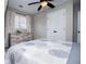 Comfortable bedroom with neutral walls, carpet, ceiling fan and double door closet at 2763 Nautical Way, Villa Rica, GA 30180