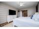 Bedroom featuring shiplap walls, ceiling fan, and cozy decor at 2763 Nautical Way, Villa Rica, GA 30180