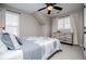 Comfortable bedroom featuring neutral walls, carpet, ceiling fan and dresser for storage at 2763 Nautical Way, Villa Rica, GA 30180