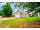 Charming home featuring a well-maintained lawn, attached garage, and inviting curb appeal at 2763 Nautical Way, Villa Rica, GA 30180