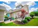 Exterior of home with patio, landscaping and blue sky at 2763 Nautical Way, Villa Rica, GA 30180