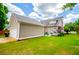 Charming home featuring a well-maintained lawn, attached garage, and inviting curb appeal at 2763 Nautical Way, Villa Rica, GA 30180