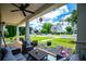 Spacious covered front porch with ample seating, providing a perfect spot to unwind and enjoy the surrounding views at 2763 Nautical Way, Villa Rica, GA 30180