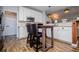 Modern kitchen features stainless steel appliances, white cabinets, and ample counter space at 2763 Nautical Way, Villa Rica, GA 30180