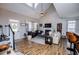 Bright living room with vaulted ceilings, wood floors, and comfortable seating at 2763 Nautical Way, Villa Rica, GA 30180