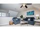 Inviting living room featuring two sofas, a ceiling fan and an accent wall at 2763 Nautical Way, Villa Rica, GA 30180