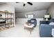 Cozy loft area with plush seating and ceiling fan for added comfort at 2763 Nautical Way, Villa Rica, GA 30180