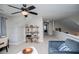 Comfortable loft area with seating, and ceiling fan with easy access to bedrooms at 2763 Nautical Way, Villa Rica, GA 30180