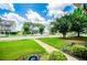 Serene neighborhood scene with manicured lawns, charming homes, and a white picket fence lining the streets at 2763 Nautical Way, Villa Rica, GA 30180