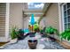 Relaxing covered patio with comfortable seating and outdoor decor at 2763 Nautical Way, Villa Rica, GA 30180