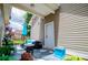 Relaxing covered patio with comfortable seating and outdoor decor at 2763 Nautical Way, Villa Rica, GA 30180