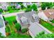 Charming home with a grey roof, dormer windows, and lush green lawn at 2763 Nautical Way, Villa Rica, GA 30180