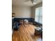 Cozy living room featuring hardwood floors, neutral walls, and a bright window at 50 Ranger Se Rd, Cartersville, GA 30121
