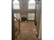 Bright and airy living room featuring a fireplace, large windows, and an open floor plan at 50 Ranger Se Rd, Cartersville, GA 30121