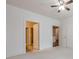 Spacious bedroom showing access to ensuite bath and hallway at 901 Abernathy Ne Rd # 3020, Atlanta, GA 30328