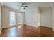 Bright bedroom with hardwood floors and light walls that offers a cozy, relaxing space to rest and unwind at 901 Abernathy Ne Rd # 3020, Atlanta, GA 30328