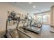 Treadmills and fitness equipment fill this spacious gym with large mirrors at 901 Abernathy Ne Rd # 3020, Atlanta, GA 30328