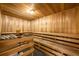 Community sauna featuring wooden walls, benches, and hot rocks at 901 Abernathy Ne Rd # 3020, Atlanta, GA 30328