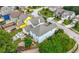 Lovely home featuring a well-manicured backyard, lush trees and a inviting outdoor seating area at 240 Daisy Cir, Mcdonough, GA 30252