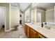 Well-lit bathroom featuring dual sinks and a luxurious soaking tub at 240 Daisy Cir, Mcdonough, GA 30252