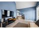 Spacious bedroom featuring a TV area and view to main bedroom with great natural light at 240 Daisy Cir, Mcdonough, GA 30252