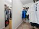 Walk-in closet with clothing racks and shelves, offering ample storage space and easy organization at 240 Daisy Cir, Mcdonough, GA 30252