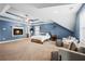 Spacious main bedroom suite featuring high ceilings, a fireplace, and ample seating at 240 Daisy Cir, Mcdonough, GA 30252